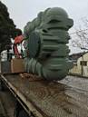 A green plastic object on a truck

Description automatically generated