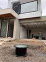 A picture containing building, outdoor, waste container, sky

Description automatically generated